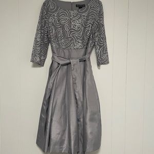 Elegant grey dress with pockets